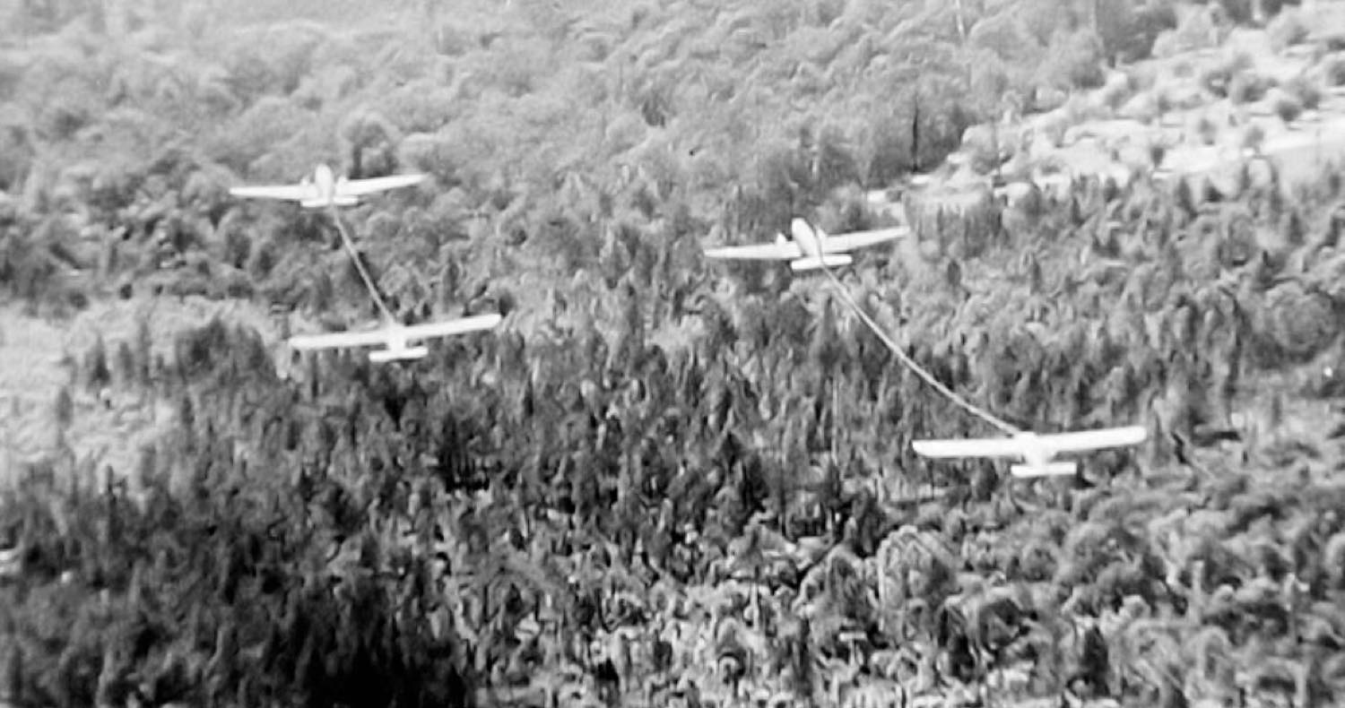 A C-47 towing a CG-4 glider