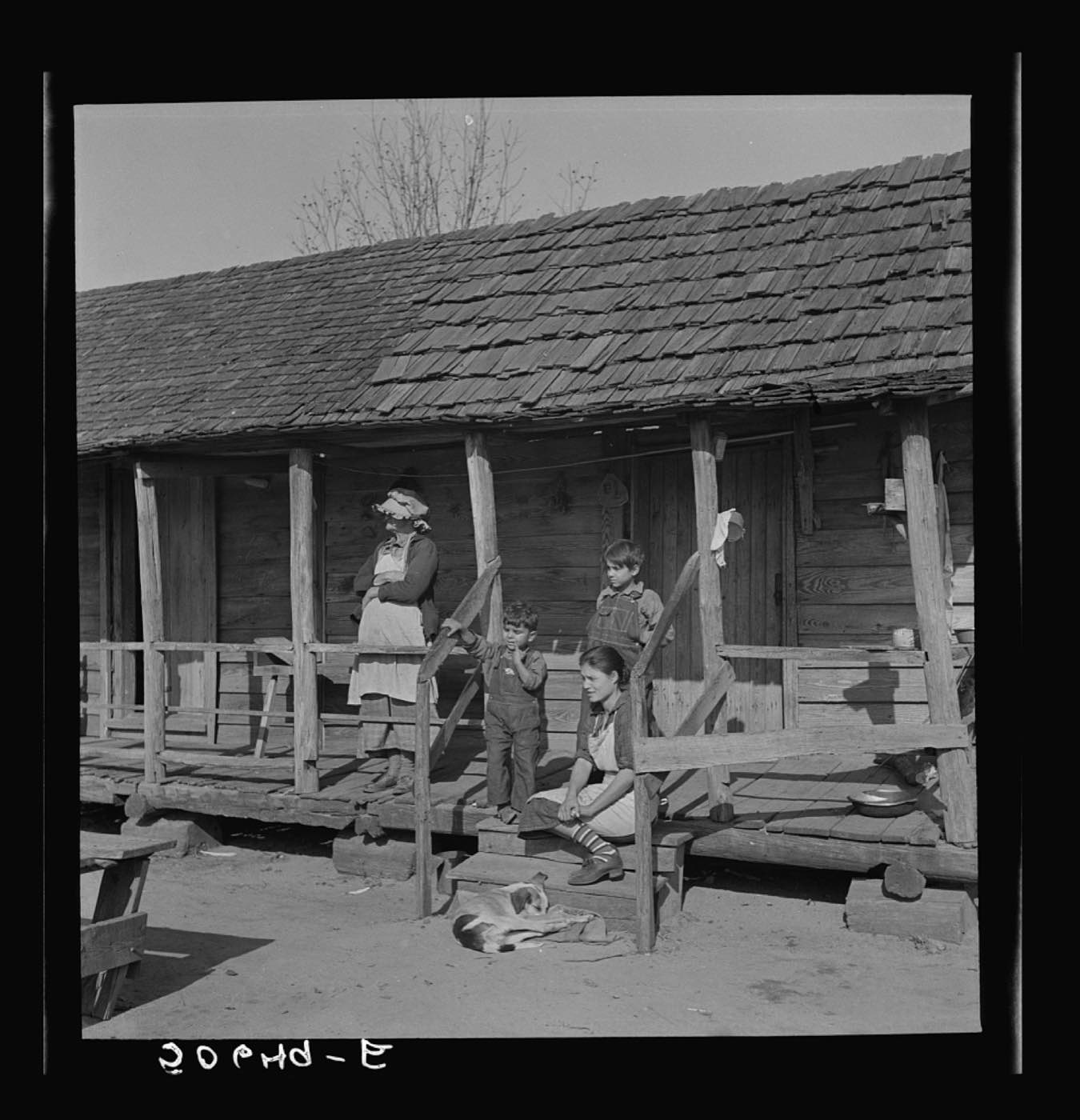 A Lumbee family on their front porch, Pembroke Farms
